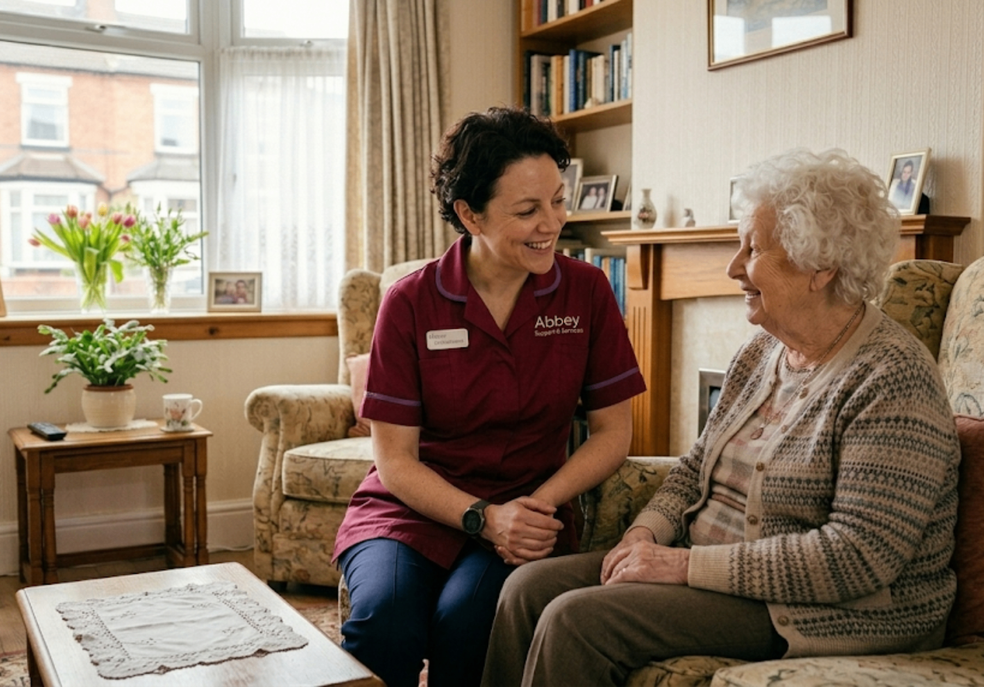 A family carer resting in the garden while an Abbey Support & Services respite carer looks after their loved one inside — flexible respite care and sitting services across Leicester and Leicestershire